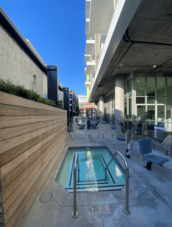Spa/hot tub with outdoor shower